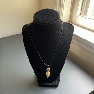 Necklace with good potion